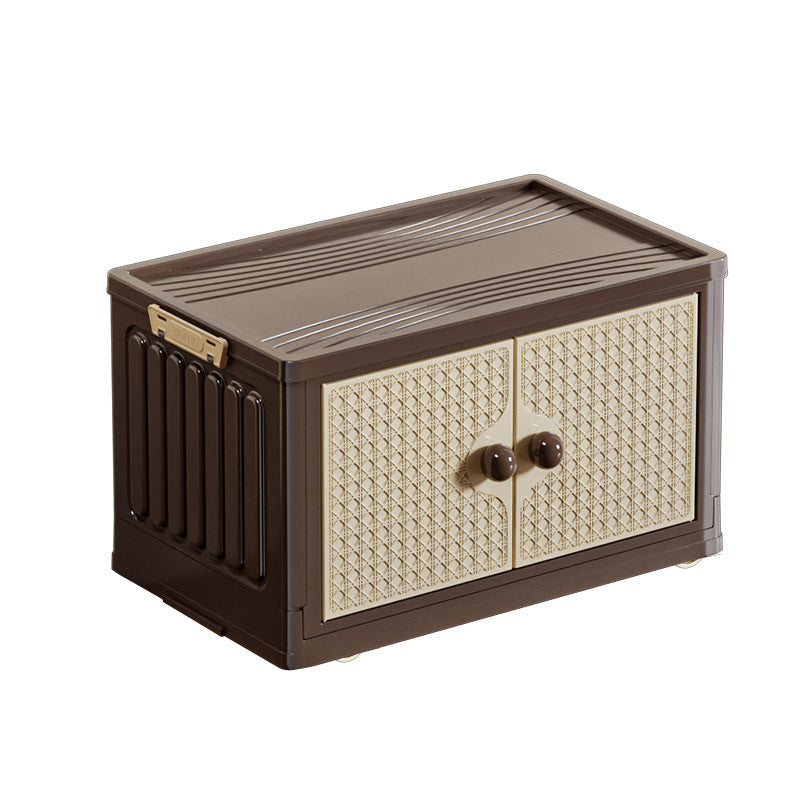 Small storage box with a textured surface and decorative handle on a white background